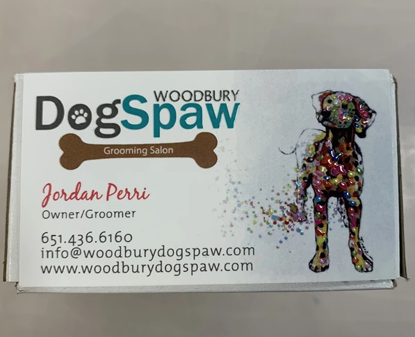 Business card with raised spot UV features